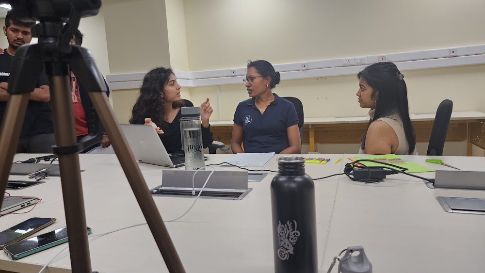 Podcast recording set with Diya and hosts